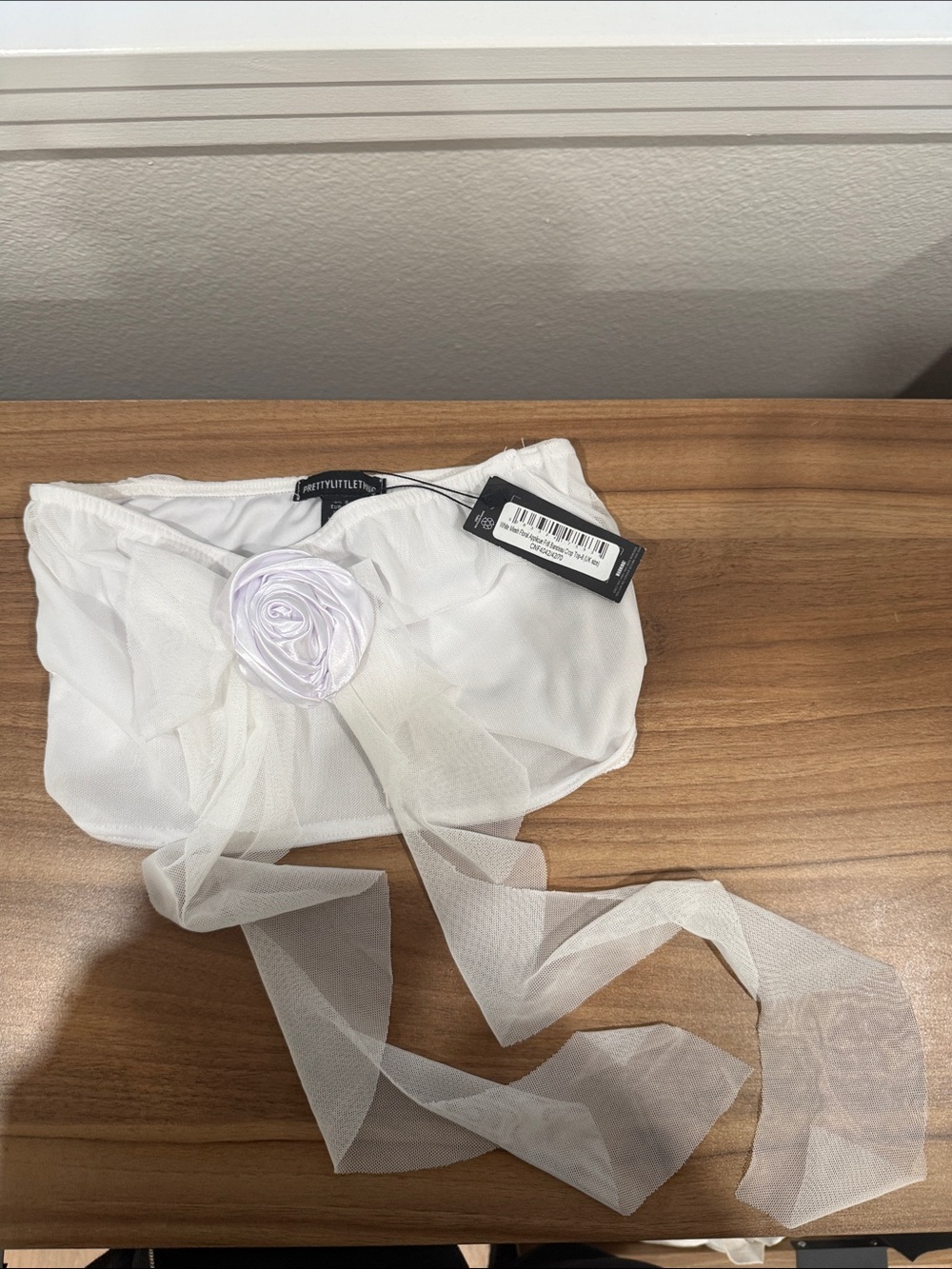 PrettyLittleThing White Sheer Bandeau Crop Top with Rosette